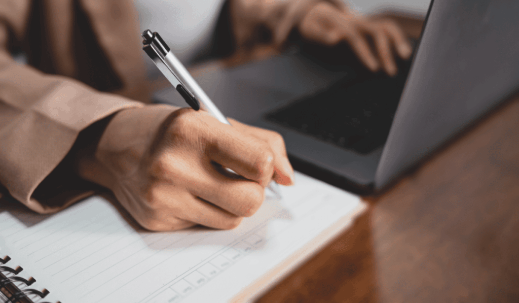 Outsourcing content creation strategy showing professional writers supporting scalable content marketing and SEO growth