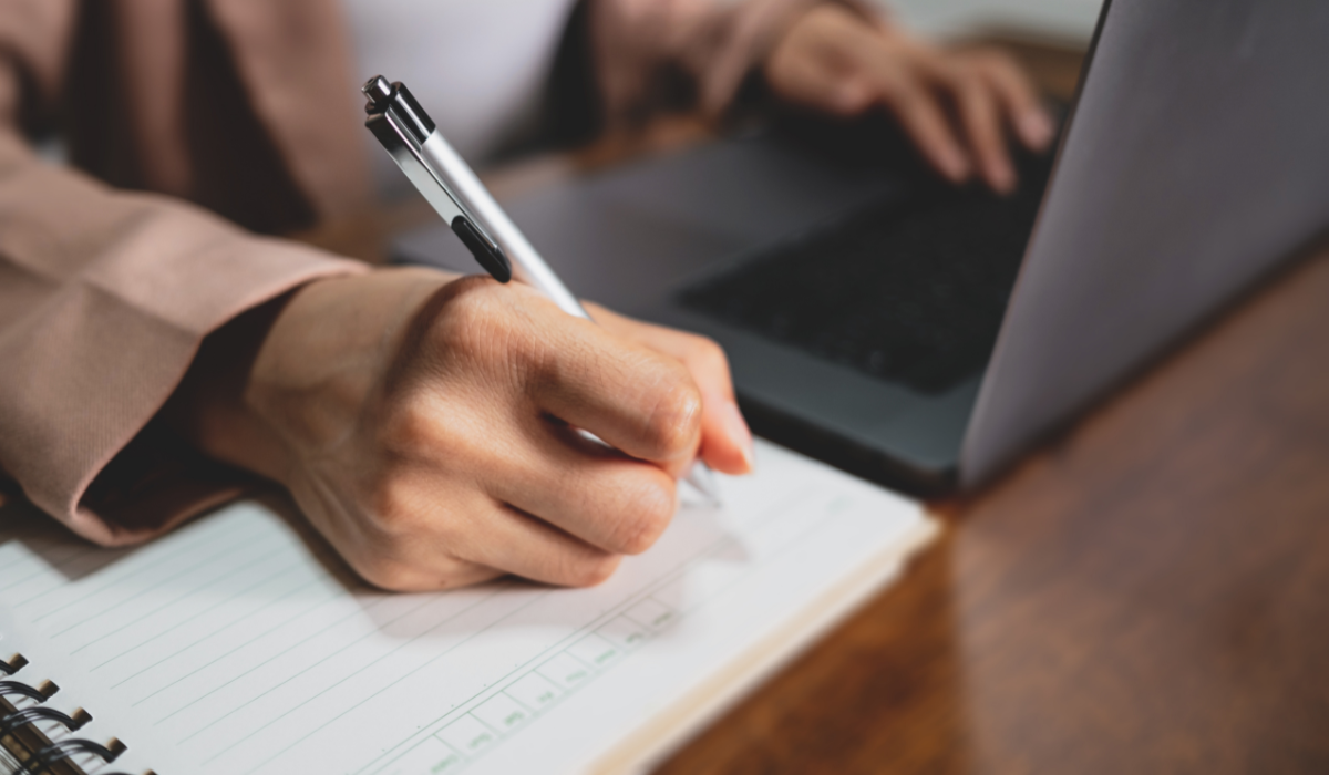 Outsourcing content creation strategy showing professional writers supporting scalable content marketing and SEO growth